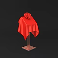 Red Tablecloths With Flower Arrangements On Metal Stands Against Black Background