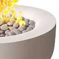 Two Round Modern Outdoor Concrete Fire Pits with Burning Flames and Decorative Pebbles