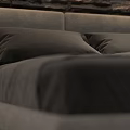 Cozy Double Bed with Stone Wall Background Sofa Pillows and Cactus Decor on Small Table