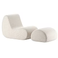 Modern Leisure Chair With Rounded Beige Fabric Design And Matching Ottoman