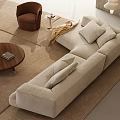 Beige L Shaped Sofa With Cushions And Circular Wooden Coffee Table Set