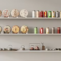 Elegant Tea Sets Display with Round Tea Cakes and Various Colored Tea Cans on Shelves