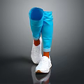 White Casual Sneakers Worn With Blue Pants On Legs Against Gray Reflective Floor