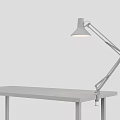 Modern Black Adjustable Arm Desk Lamp On Wooden Desk With Gray Background