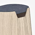 Modern Wooden Stool With Blue Cushioned Seat And Natural Wood Grain Design