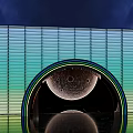 Contemporary Arched Entrance Building With Striped Facade Moon Display And Reflection Against Teal Sky