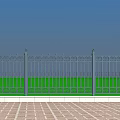 Ornate Iron Fence With Spiked Top Green Base And Brick Floor Against Blue Sky