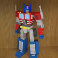 Electric Toy Robot Action Figure Standing Red Blue White Detailed Design