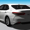 Silver Toyota Camry Sedan Rear View With Modern Sleek Exterior Design