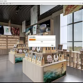 Traditional Cultural Products Store Interior With Wooden Shelves Bright Display And Windows