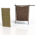 Green Geometric Patterned Mat And Brown Blanket On Metal Rack For Daily Use