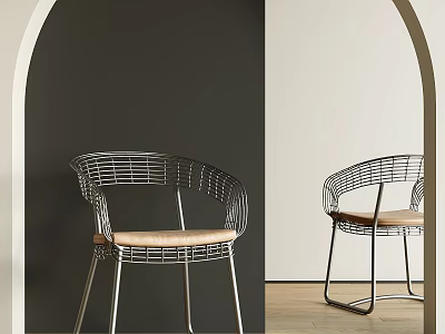 Modern Metal Frame Dining Chairs With Curved Design And Light Colored Seat In Arched Interior 3d model