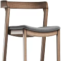 Modern Wooden Bar Stool With Gray Padded Seat And Tall Frame Design