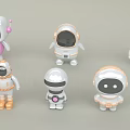 Colorful Robot Astronaut Dolls with Various Helmet Designs and Decorative Features 3d model