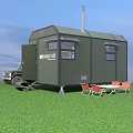Green Mobile Camping Trailer With SUV Table Red Chairs On Grassland