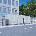 Outdoor Industrial Equipment With Blue Units Near White Building With Fence And Container Structure