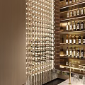 Stylish Bar Counter Interior With Illuminated Wine Rack And Neatly Arranged Bottles