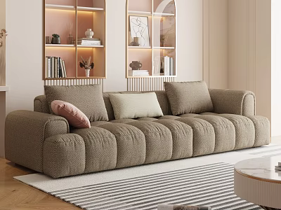 Modern Plush Beige Three Seater Sofa With Pastel Cushions Against Lit Shelves And Striped Rug 3d model