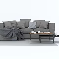 Gray Sectional Sofa With Multiple Pillows Throw Blanket And Coffee Table 3d model