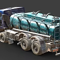Old Blue Tanker Truck With Large Green Storage Tank Multiple Wheels And Worn Exterior