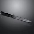 Tactical Weapon Knife With Black Textured Handle And Sharp Metal Blade