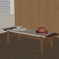 Minimalist Wooden Coffee Table With Books And Hat Near Window And Cabinets