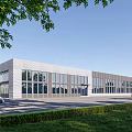 Modern Industrial Factory Building With Large Glass Windows Metal Exterior Parking Area And Green Landscaping