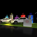 White Cars On Green Grass Display Platform With Colorful Lights And Nissan Logo