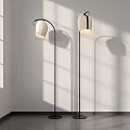 Modern Floor Lamp Design With White Lampshade Black Metal Stand And Soft Shadow Effects