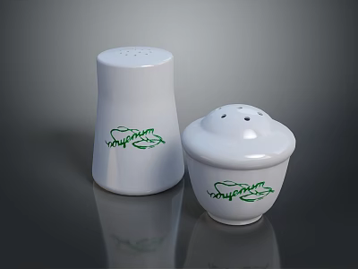 White Ceramic Salt And Pepper Shakers With Green Decorative Patterns For Kitchen 3d model