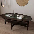 Curved Edge Dark Wooden Coffee Table With Green Marble Top Books And Wall Decor