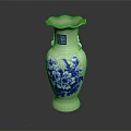 Green Ceramic Vase With Blue Peony Floral Patterns And Ruffled Rim Design