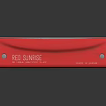 Red Hohner Harmonica With Smooth Metallic Surface And Multiple Reflective Holes