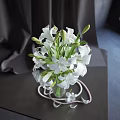 Beautiful White Lilies in Textured Glass Vase with Pearl Decor on Dark Table