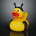 Yellow Rubber Duck Toy With Bee Antennae And Black Wings