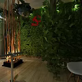 Modern Indoor Space With Lush Green Plant Wall Wooden Floor And Decorative Plants