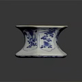 Blue And White Hexagonal Ceramic Vessel With Floral Patterns And Traditional Design