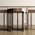 Modern Copper Framed Revolving Door With Glass Panels In Entrance Hall