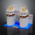 Cartoon Scenery of Lego Built Castle Towers with Golden Decorations White Brown and Blue Base