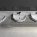 Three White Washbasins on Grey Countertop with Modern Faucets in Contemporary Bathroom