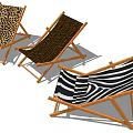 Stylish Wooden Frame Deck Chairs With Leopard Zebra And Dark Striped Patterns For Outdoor Relaxation