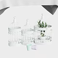 Three White Decorative Pet Cages With Carved Patterns And Potted Plants 3d model