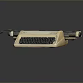 Vintage Cream Colored Typewriter With Black Keys And Metal Components On Dark Surface