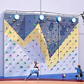 Colorful Indoor Climbing Wall With Kids Playing And Round Lights In Play Area