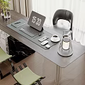 Modern Home Office Desk Setup With Laptop Coffee Cup Kettle And Potted Plant