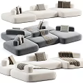 Modern Sectional Sofa in Neutral Tones with Pillows and Cozy Throws for Comfort