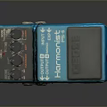 Blue Harmonizer Effects Pedal With Vintage Design And Black Knobs