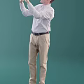 Front View Of Man In White Shirt And Khaki Pants Standing Against Green Background