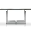 Modern Glass Top Table With Sleek Metal Frame And Contemporary Design