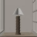 Modern Floor Lamp With Pleated Lampshade And Stacked Wooden Rings In Neutral Interior